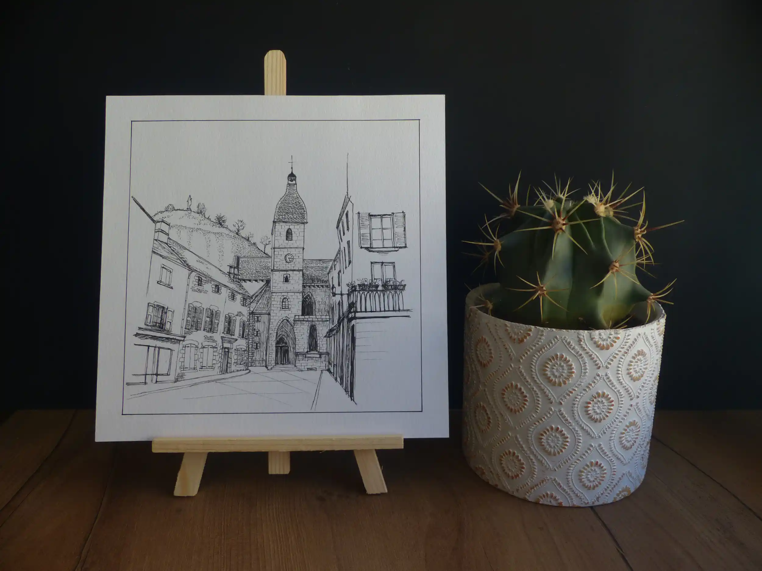 Dessin format carré de la place Marchande à Murat.